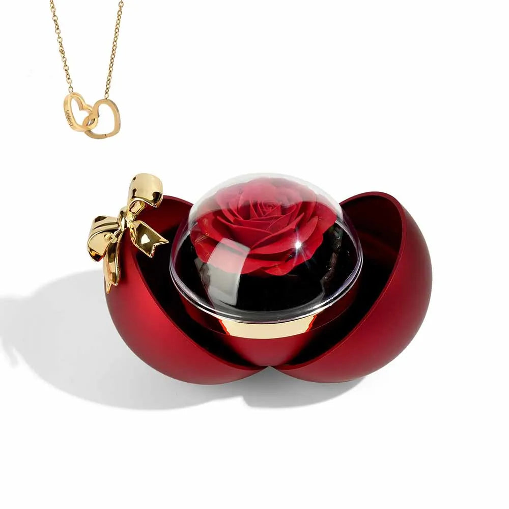 Okrągłe pudełko na biżuterię z grawerowanym naszyjnikiem